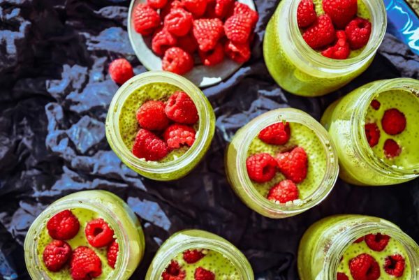 jars of green matcha chia seed pudding made with coconut milk an